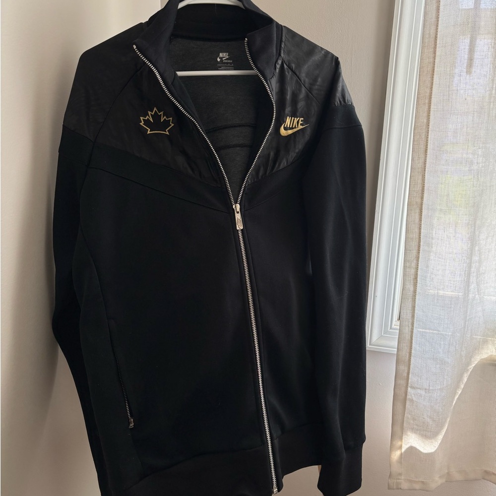 Vintage Nike Black and Gold Bomber Jacket with Metallic Accents